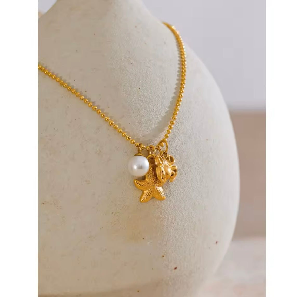 Crab and starfish necklace