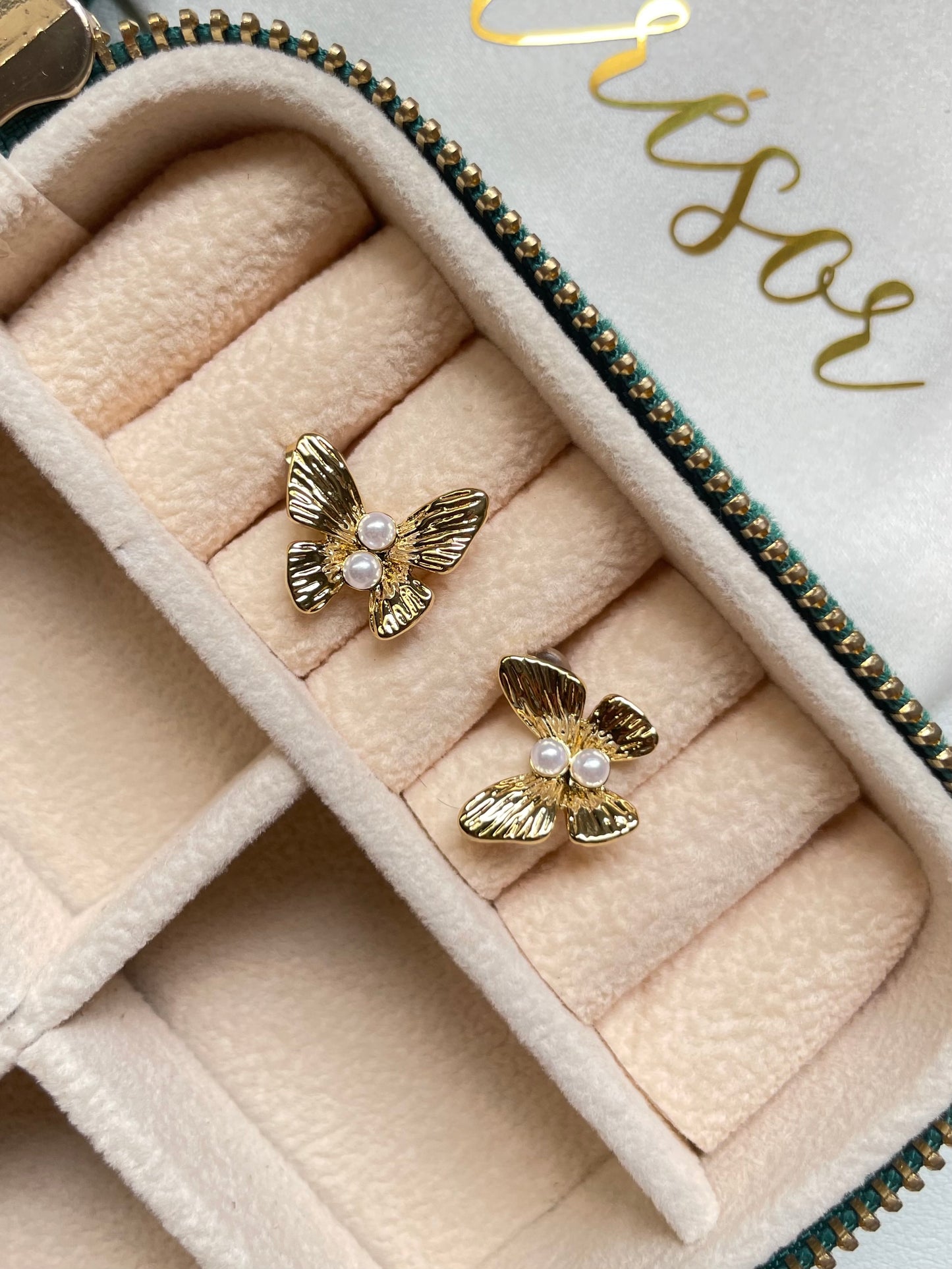 Butterfly and pearl earrings