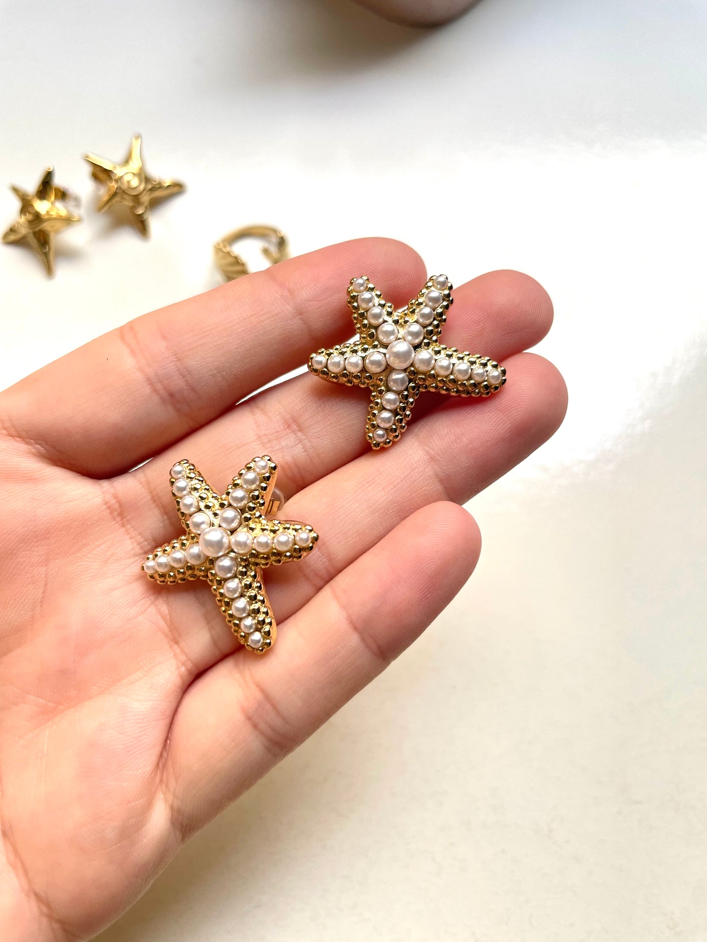 Starfish pearl earrings