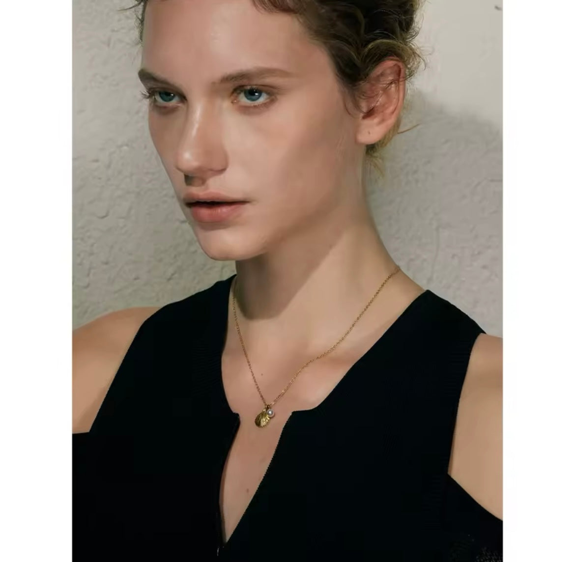 Shell and pearl necklace