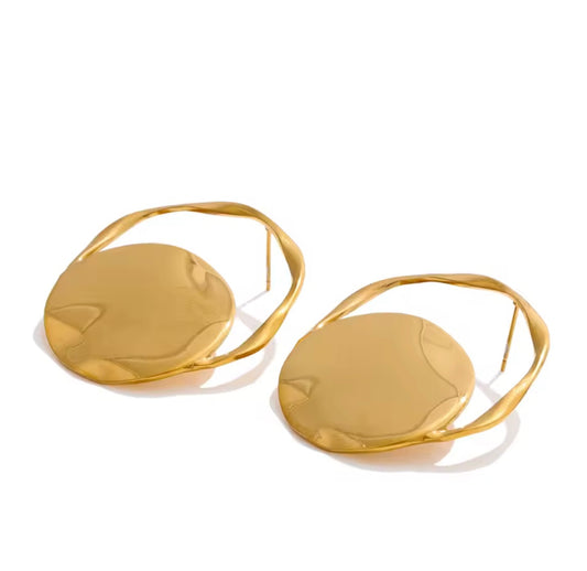 Big statement maximalist earrings