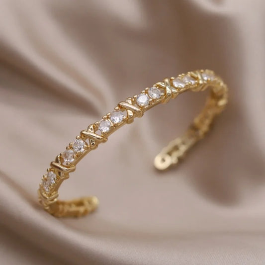 X Cross cuffs (dorado)